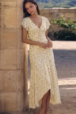 Robe asymétrique à volants et imprimé floral jaune pâle