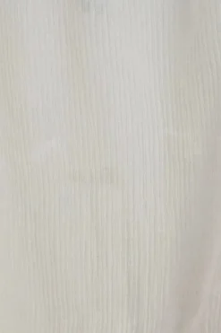 Robe blanche courte ample à bretelles