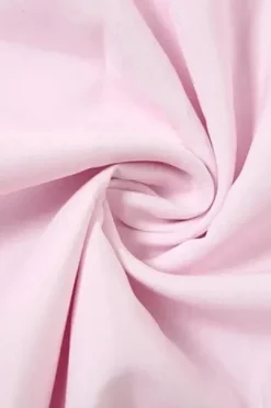 Robe courte à manches évasées avec laçage et fleurs décoratives