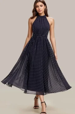Robe de cocktail bleu marine à pois sans manches col licou