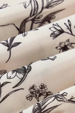 Robe de cocktail fleurie courte décolleté carré
