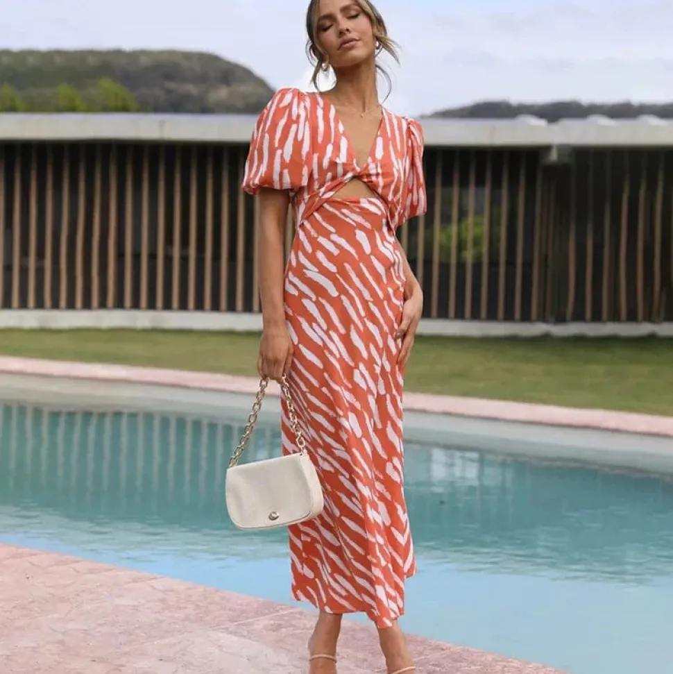 Robe de cocktail orange midi manches bouffantes
