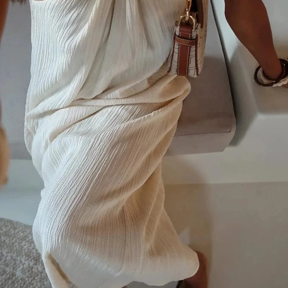 Robe de plage blanche longue sans manches