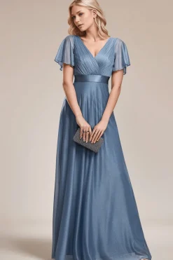 Robe de soirée bleue longue à volants et décolleté plongeant