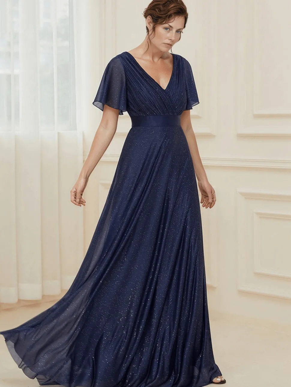 Robe de soirée bleue manches à volants scintillante