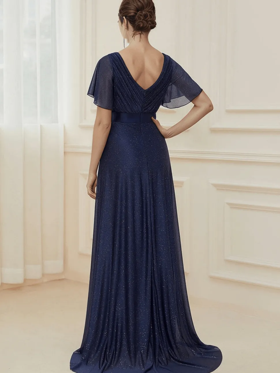 Robe de soirée bleue manches à volants scintillante