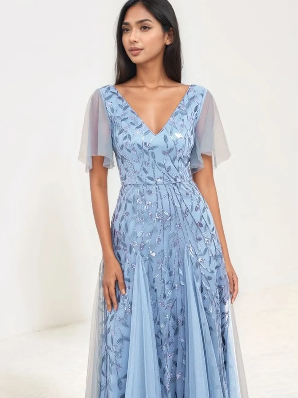 Robe de soirée bleue motif paillettes