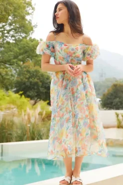 Robe fleurie invitée mariage dos nu