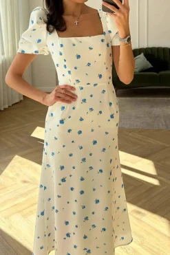 Robe fleurie midi manches bouffantes
