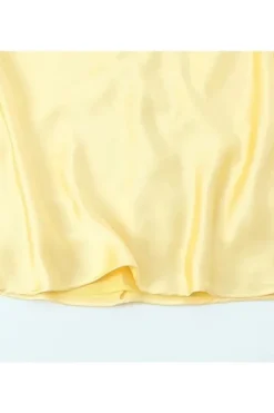 Robe longue jaune dos nu satinée