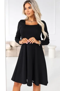 Robe noire courte habillée manches longues