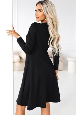 Robe noire courte habillée manches longues